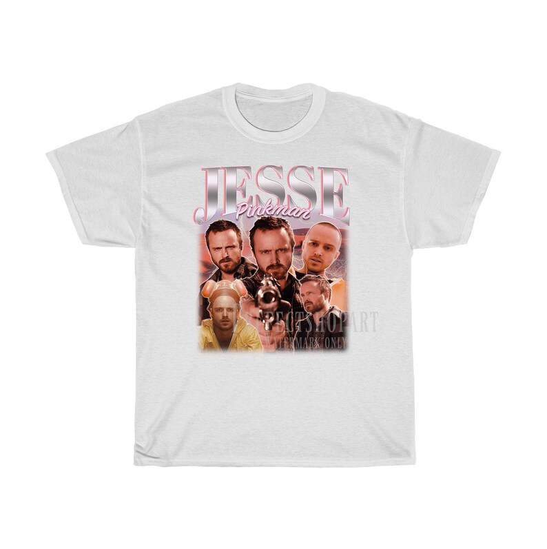 May include: White t-shirt with a graphic print of Jesse Pinkman from the TV show Breaking Bad. The graphic features a collage of images of Jesse Pinkman, including a close-up of his face and a scene from the show.