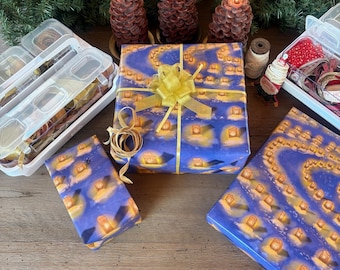 Papel de regalo navideño Farolito (Luminaria) Laberinto resplandeciente contra un paisaje nevado