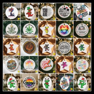May include: A collection of ceramic Christmas ornaments with various designs. Some ornaments feature bears, while others have text like "Love is Love" and "Where Words Fail, Music Speaks." Each ornament has a string for hanging.