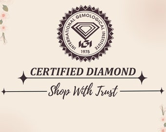 May include: A certificate of authenticity for a diamond, with a black and white logo of the International Gemological Institute (IGI) and the text "Certified Diamond Shop With Trust". The certificate also features a floral design in the background.