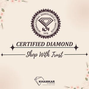 May include: A white and pink floral background with a black and white logo for the International Gemological Institute (IGI) with the text "Certified Diamond Shop With Trust" and a smaller logo for Khamkar Diamond.
