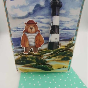 Carte ours marin à la mer gardien de phare en Bretagne