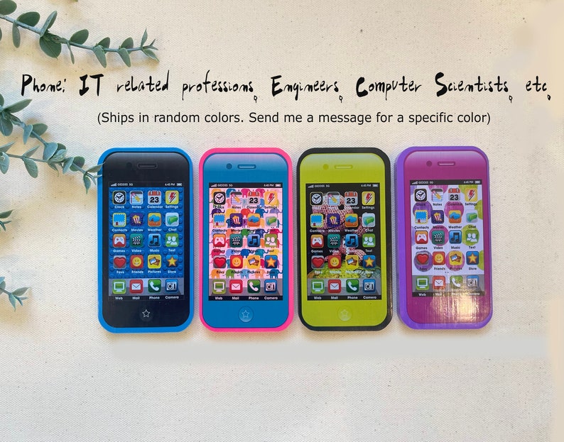 May include: Four toy cell phones in different colors: blue, pink, yellow, and purple. Each phone has a screen with icons for apps like clock, calendar, weather, games, music, and more. The text on the phones reads "Phome: IT related professions Engineers Computer Scientists, etc (Ships in random colors. Send me a message for a specific color)"