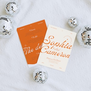 May include: A wedding invitation suite with a white background and orange text. The invitation reads "Sophia and Cameron" with the date "28th August 2023". The RSVP card has a peach background with white text and details about the ceremony and reception.