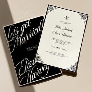 Puede incluir: Elegantes invitaciones de boda en blanco y negro. Una invitación presenta el texto "Let's get Married!" y los nombres "Eliza Harvey". La otra muestra "Eliza Holloway & Henry Ellsworth" con detalles decorativos en las esquinas.