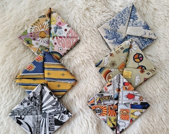 This square of fabric is a very practical purse for storing coins and bills, origami purse