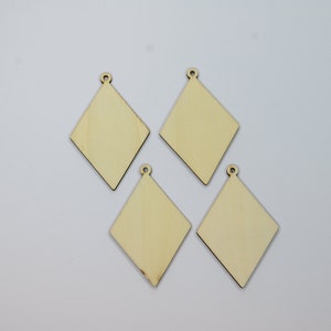 May include: Four unfinished wooden diamond-shaped ornaments with holes for hanging.