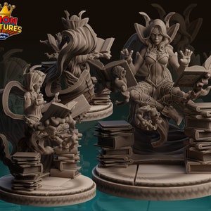 May include: Two 3D printed miniature figures of women with flowing robes and wings, each holding a book and surrounded by stacks of books. The figures are posed in a dynamic, magical style.