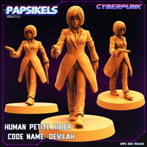 May include: A cyberpunk themed miniature figurine of a woman in a suit holding a gun. The figurine is painted in a beige color and has a detailed design. The text "HUMAN PETITE KILLER CODE NAME: DEVILAH" is printed below the figurine.