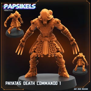 May include: An orange-toned figurine of a futuristic warrior, with a detailed armored design and claw-like hands. The figure is on a black base, with two smaller versions of the figure in the background. The text "PAYATAS DEATH COMMANDO 1" is visible.