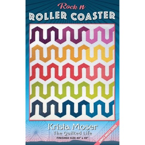 May include: A quilting pattern called "Rock n Roller Coaster" by Krista Moser, The Quilted Life. The pattern features a colorful zig-zag design with a finished size of 44 inches by 49 inches.