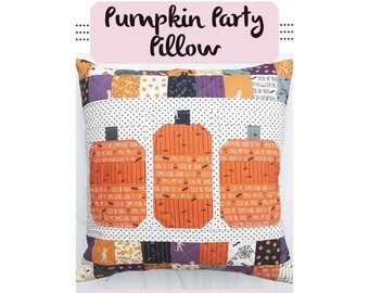 May include: Square Halloween-themed pillow with three orange pumpkin appliqués on a white polka-dot background. The pumpkins have black stems and are inscribed with text. The pillow is 18 x 18 inches.