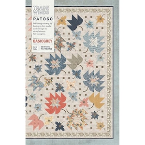 May include: A sewing pattern for a quilt featuring a design of colorful leaves on a beige background. The pattern is called "Trade Winds" and is by BasicGrey for Moda. The pattern number is PAT060.