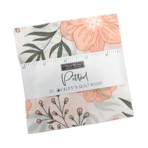 May include: A stack of fabric squares with a floral pattern. The fabric features large peach-colored flowers, green leaves, and small sprigs on a white background. A white band with the word "Potted" and the brand name is wrapped around the fabric squares.