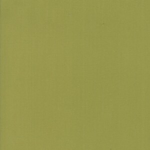 May include: A solid green fabric swatch. The fabric has a subtle texture.