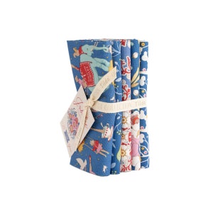 May include: A set of six fabric squares featuring a whimsical blue and red pattern with a circus theme. The fabric squares are tied together with a white ribbon and a tag that reads "Just Imagine Tilda Collection".