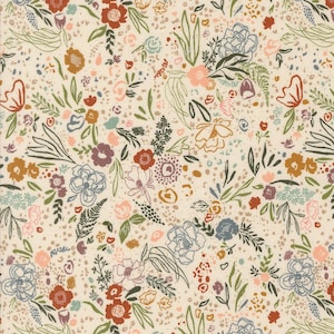 May include: A cream-colored fabric with a repeating floral pattern. The design features various flowers in shades of red, pink, blue, and brown, along with green leaves and stems. The background has small, speckled details.