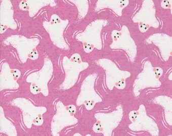 May include: A pink fabric with a repeating pattern of white ghosts with smiling faces. The ghosts are outlined in white and have a swirling design around them.