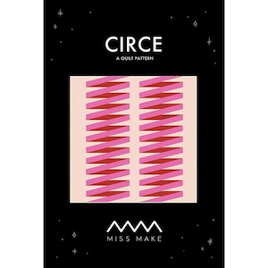 May include: A quilt pattern called "Circe" by Miss Make. The pattern features a pink and red geometric design with a zig-zag pattern.