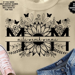 May include: Black and white design of the word "MOM" with a sunflower and floral accents. The names "mila", "noah", and "emma" are written below the letters.