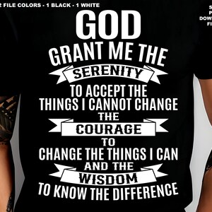 May include: Black and white graphic design on a black t-shirt with the text "God Grant Me The Serenity To Accept The Things I Cannot Change The Courage To Change The Things I Can And The Wisdom To Know The Difference".