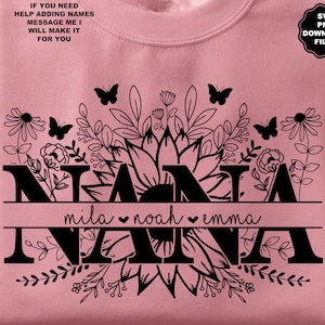 May include: Black and white graphic design of the word "NANA" with a floral design and the names "mila", "noah", and "emma" written below. The design is on a pink background.