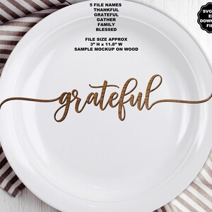 May include: A wooden cutout of the word grateful in a cursive script font. The text is centered on a white plate. The image includes text listing 5 file names: THANKFUL, GRATEFUL, GATHER, FAMILY, BLESSED, and a file size of 3 inches H by 11.8 inches W.