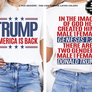 May include: Two white t-shirts with red and blue text. The first shirt says "TRUMP AMERICA IS BACK" with stars and stripes. The second shirt says "IN THE IMAGE OF GOD HE CREATED HIM; MALE AND FEMALE GENESIS 1:27 THERE ARE TWO GENDERS MALE AND FEMALE DONALD TRUMP".