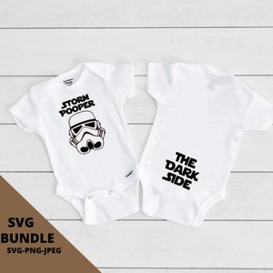 May include: White baby onesie with a black and white image of a Stormtrooper helmet and the text "Storm Pooper". The back of the onesie has the text "The Dark Side".