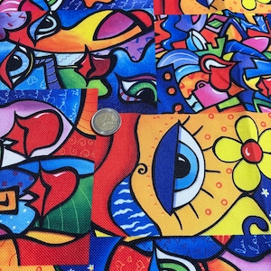 May include: Vibrant abstract fabric with a patchwork design. The fabric showcases bold colours like red, blue, yellow, and orange. A ruler displays measurements in centimetres and inches. A coin is also visible.