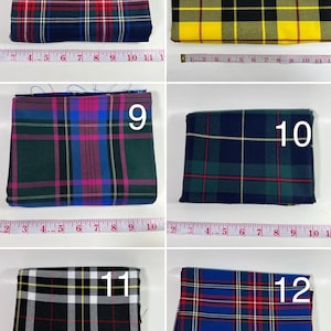 May include: Six folded fabric swatches with plaid patterns labeled 7 through 12. Each swatch is positioned above a measuring tape showing widths up to 11 inches. The patterns feature various color combinations including red, blue, yellow, green, and black.