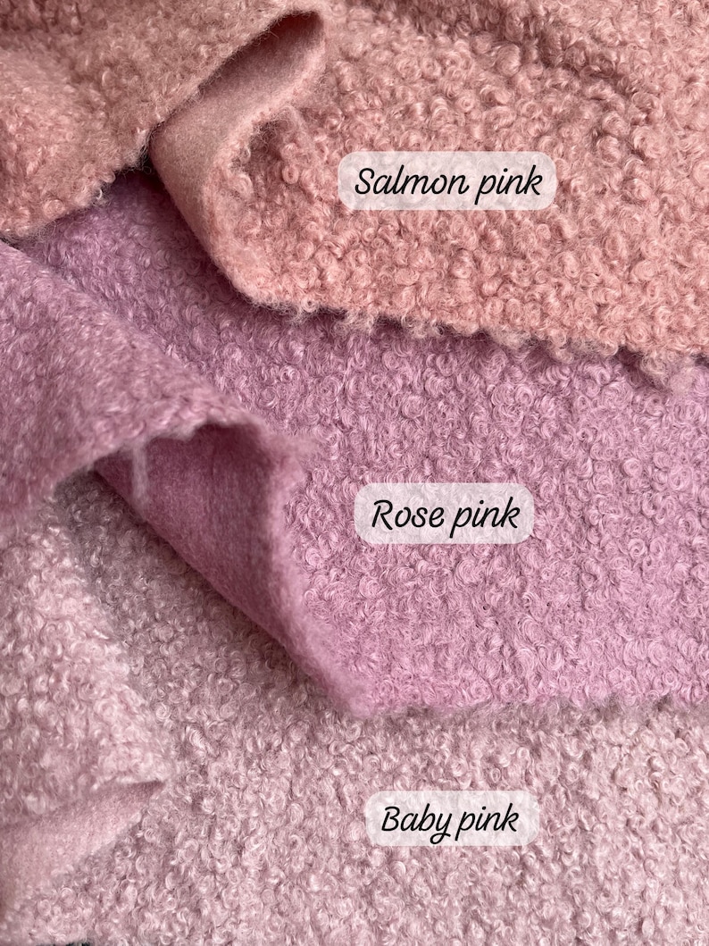 May include: Close-up of three fabric swatches in shades of pink. The top swatch is salmon pink, the middle is rose pink, and the bottom is baby pink. The colour names are written on the fabric.
