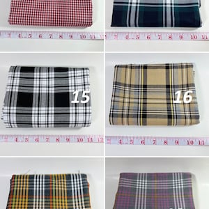 May include: Six folded fabric swatches labeled 13 through 18, each featuring distinct plaid or gingham patterns in red, green, black, tan, yellow, and purple, displayed alongside a measuring tape showing lengths up to 11 inches for each piece.