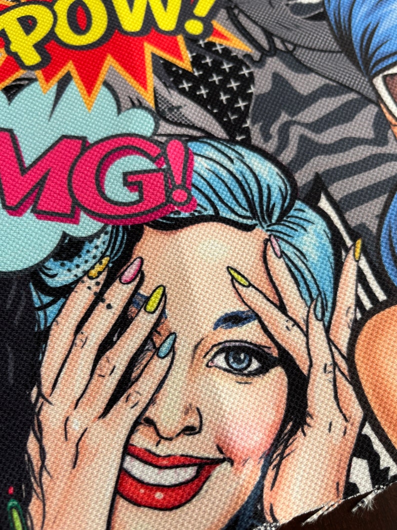 May include: A colorful pop art style illustration of a woman with blue hair, covering her eyes with her hands. The woman is smiling and has red lipstick. The background is a mix of black, white, and gray patterns with the words "POW!" and "OMG!" in bright colors.