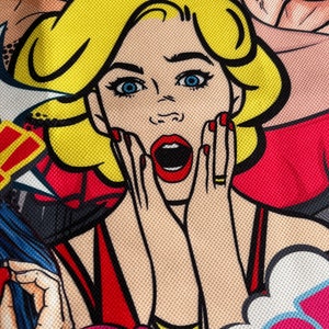 May include: A close-up of a woman's face with bright blue eyes and red lipstick. She is wearing a red dress and has her hands on her cheeks in a surprised expression. The background is a colorful comic book style pattern.