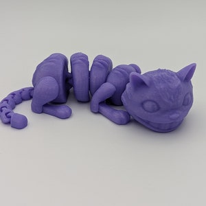 Chat du Cheshire articulé