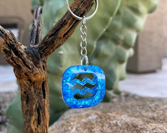 Llavero Hoja de Resina y Foil. Llavero dividido del signo del zodiaco.