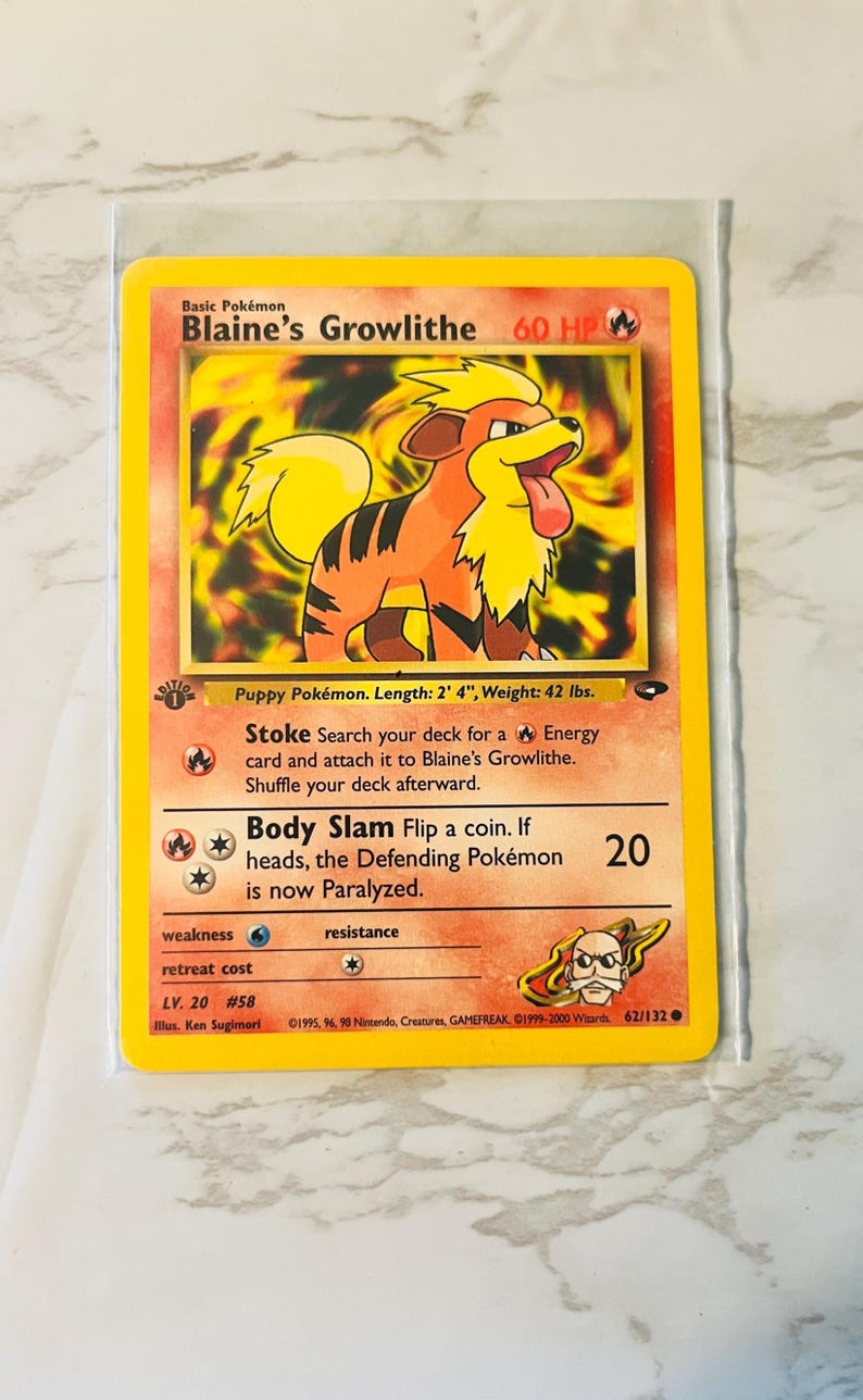 以下が含まれることがあります： 基本ポケモンのブーメランのポケモンカード。カードは黄色の縁取りで、燃えるようなオレンジと黄色のブーメランのイラストが表示されています。カードテキストには攻撃の説明とレベル20が含まれています。