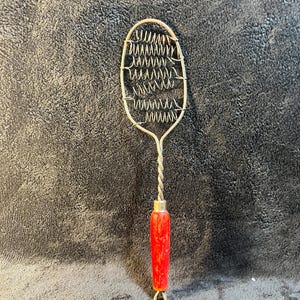 May include: A set of three ceramic mugs with a speckled, matte finish. The mugs are in shades of cream, light gray, and dark gray. Each mug has a simple, minimalist design, perfect for coffee or tea.