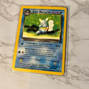 dark wartortle pokemon card CGC 8.5 Team Rocket 1st Edition 46/82 NM/Mint PSA Pokmon Hit Points60 HP Form Dark Wartortle #46/82 (LP) Team