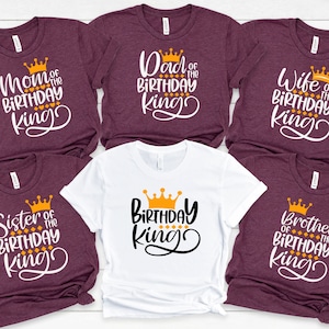 May include: Six maroon t-shirts with white text and a gold crown graphic. The shirts say "Mom of the Birthday King", "Dad of the Birthday King", "Wife of the Birthday King", "Sister of the Birthday King", "Birthday King", and "Brother of the Birthday King".