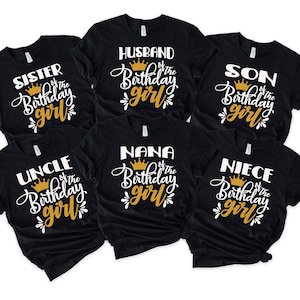May include: Six black t-shirts with white text and a gold crown. The shirts say "Sister of the Birthday Girl", "Husband of the Birthday Girl", "Son of the Birthday Girl", "Uncle of the Birthday Girl", "Nana of the Birthday Girl", and "Niece of the Birthday Girl".