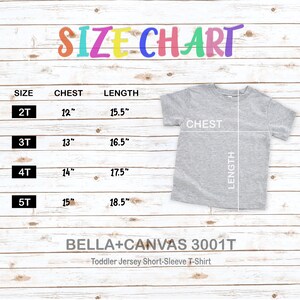 May include: Size chart for toddler jersey short-sleeve t-shirts. The chart shows sizes 2T, 3T, 4T, and 5T with corresponding chest and length measurements in inches.