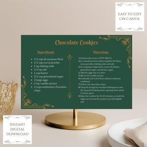 May include: Printable recipe card with a green background and gold accents. The card features a recipe for chocolate cookies with a list of ingredients and directions. The text "Chocolate Cookies" is in a large, decorative font.