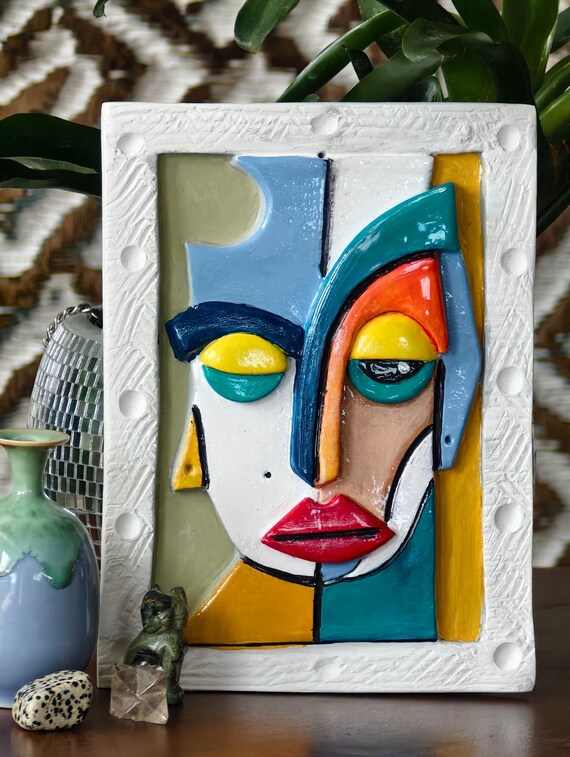 Handcrafted wall art clay face decor