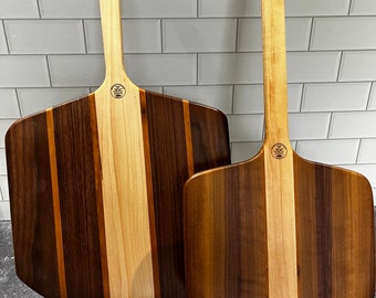 Handcrafted hardwood pizza peels!  Walnut, maple and cherry, Made by us in Sparta, NJ. Personalized engraving available.