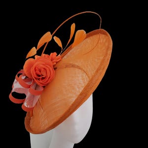 Sinamay hatinator in appealing colors for Derby, Royal ascot, mother of bride/groom, christening.