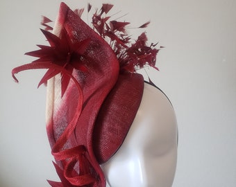 This sinamay beauty is handmade with love for Derby, Ascot, weddings, Christening, mother of bride/groom and all events.