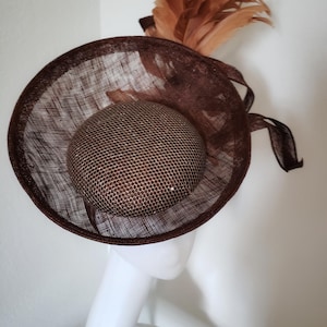 Gorgeous Sinamay fascinator in choice of colors for Derby, wedding, mother of bride/groom & all events.