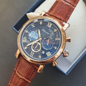 Reloj cronógrafo para hombre con fase lunar rosa, luminoso, números romanos clásicos, oro rosa, correa de cuero marrón, reloj de pulsera profesional para caballero. imagen 2